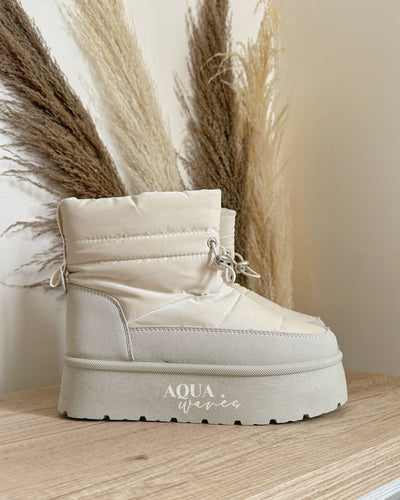 PANTUBOTA IMPERMEABLE CREMA
