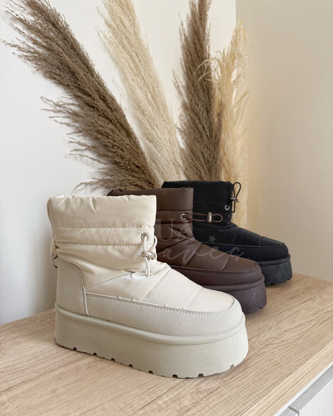 PANTUBOTA IMPERMEABLE CREMA
