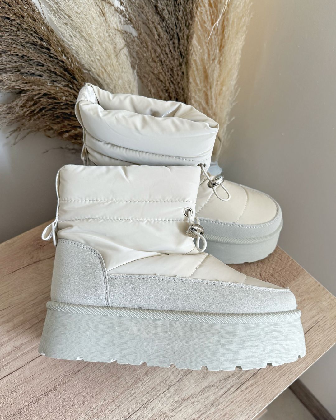 PANTUBOTA IMPERMEABLE CREMA